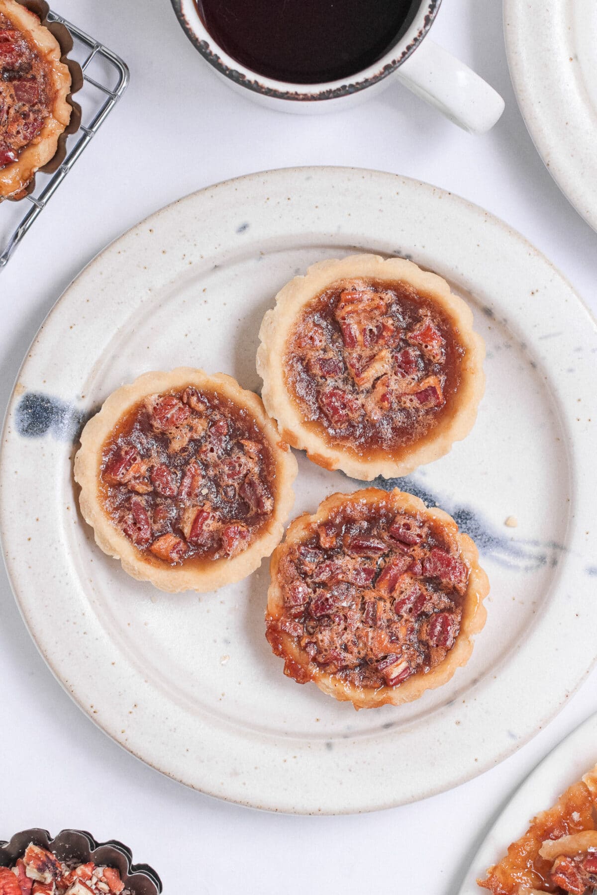 Flaky pastry with a gooey, sweet filling – this classic Canadian butter tarts recipe is a beloved treat made with simple pantry ingredients.