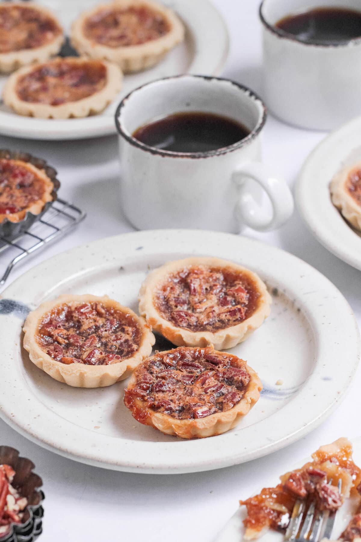 Flaky pastry with a gooey, sweet filling – this classic Canadian butter tarts recipe is a beloved treat made with simple pantry ingredients.