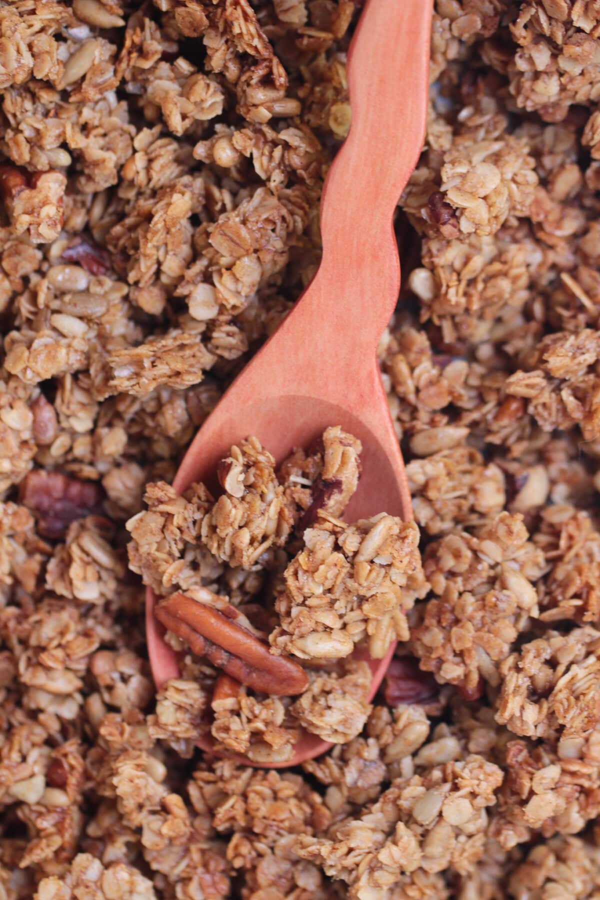 Easy Maple Brown Butter Granola with oats, pecans, sunflower seeds, real maple syrup, and rich brown butter for a crunchy homemade breakfast.
